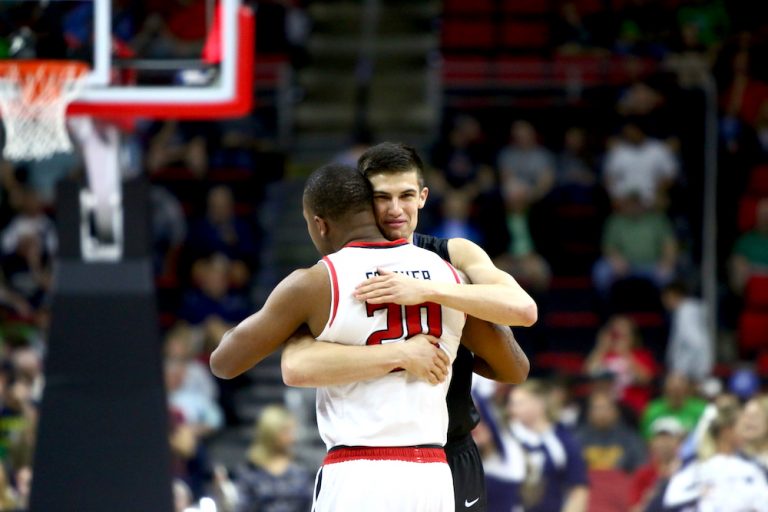 Kellen Dunham (24) and Toddrick Gotcher (20) embrace before the game. Butler defeats Texas Tech 71-61 during the First Round of the NCAA Tournament in Raleigh, NC on March 17, 2016.