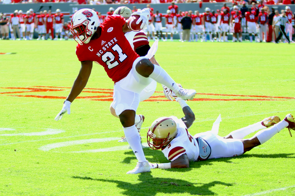 Matthew Dayes (21) steps around a tackler. Boston College defeated NC State 21-14 on October 29, 2016 at Carter-Finley Stadium in Raleigh, North Carolina. (Jerome Carpenter/WRAL Contributor)