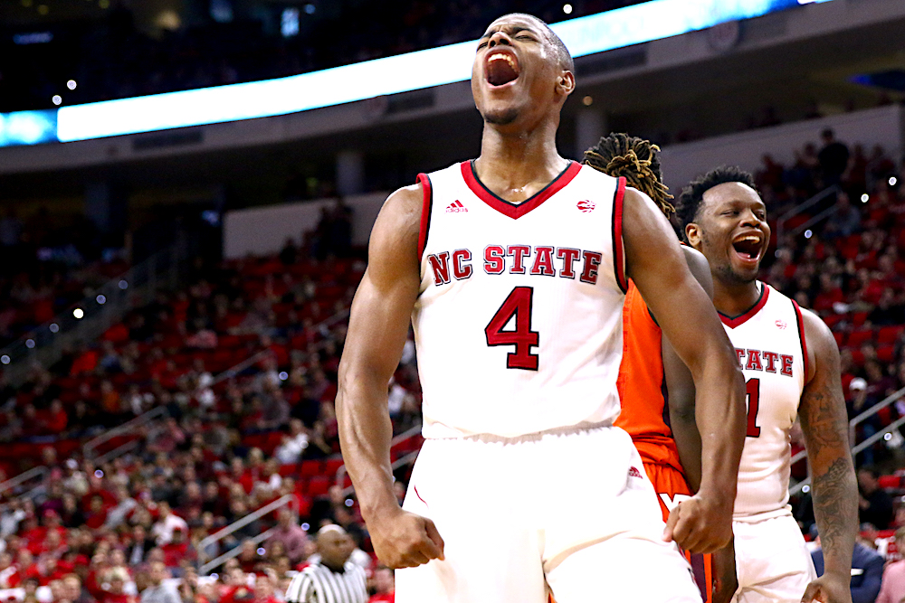 Dennis Smith Jr. (4) lets out a yell after a dunk. NC State defeated Virginia Tech 104-78 in their ACC home opener at the PNC Arena in Raleigh, NC on January 4th, 2017. (Photo by: Jerome Carpenter/WRAL Contributor)